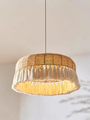 Close-up of a hemp rope pendant light, showcasing the intricate weaving and natural texture of the hemp fibers. A