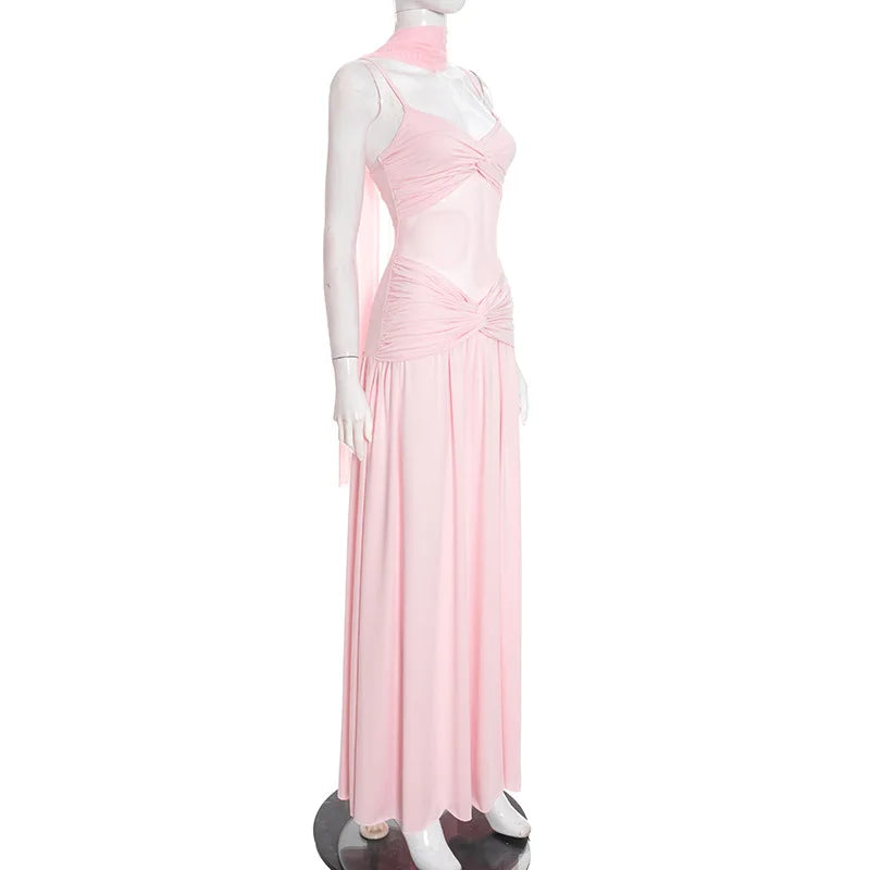Mannequin wearing a pink halter neck dress on a white background