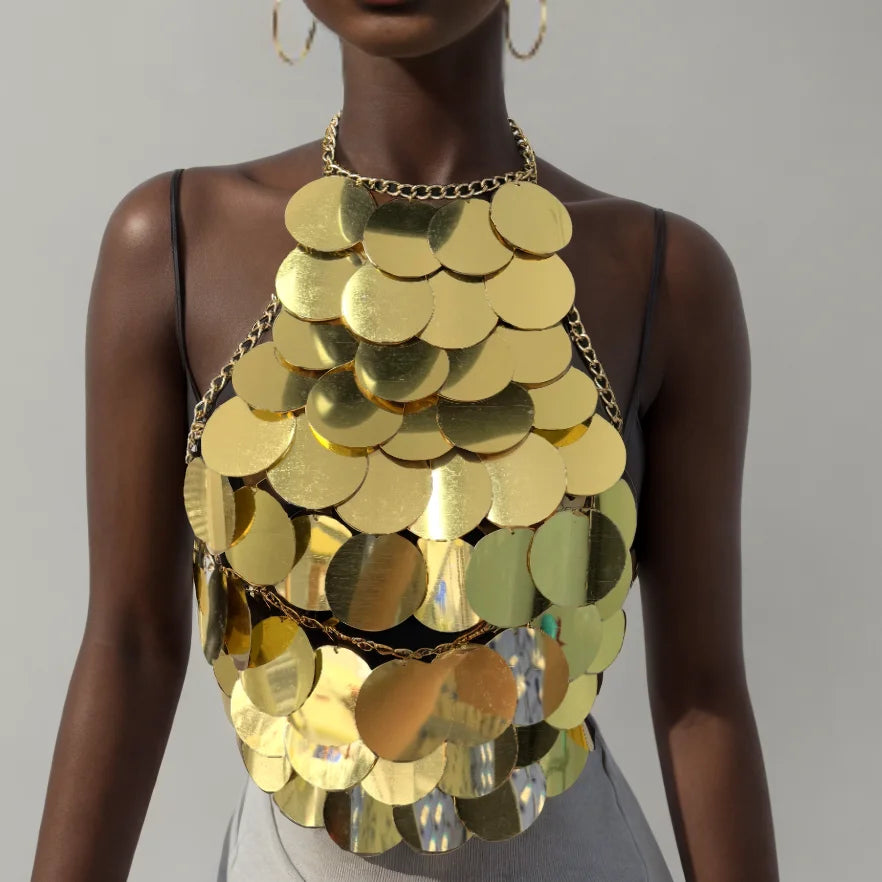 Gold sequin halter top on a model