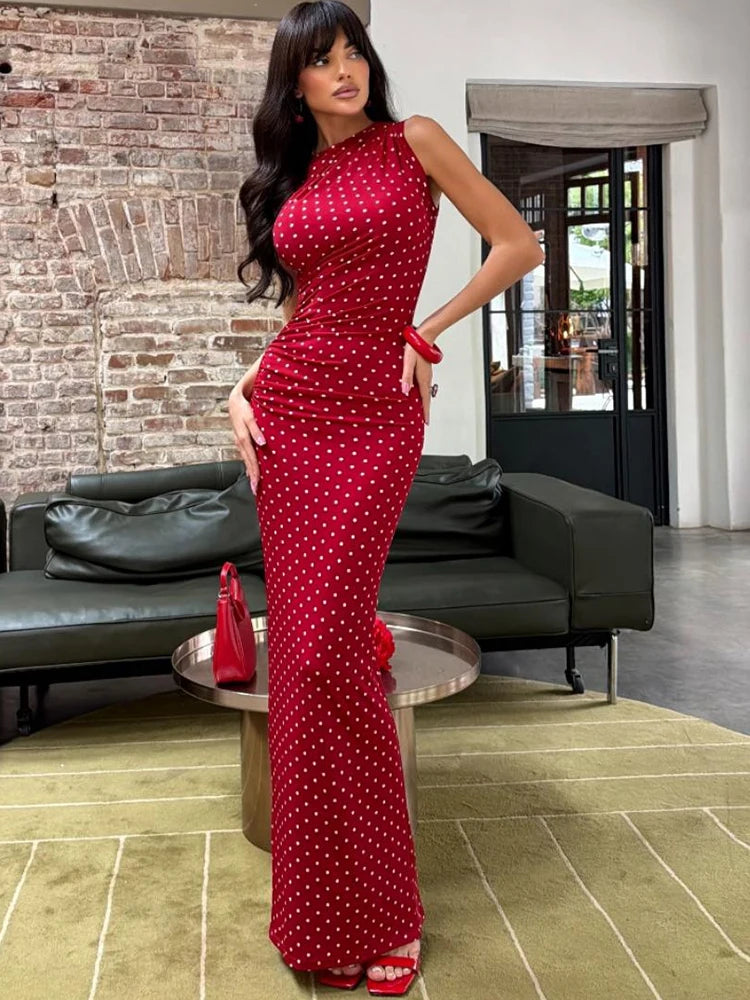 Red polka dot ruched column maxi dress on a model.