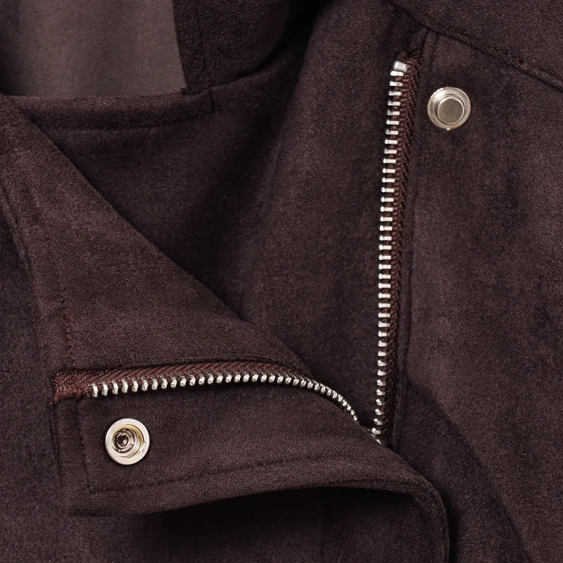Close-up of a brown jacket with zipper and buttons