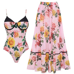 Floral print swimsuit with black trim and contrasted bust and pink floral print skirt