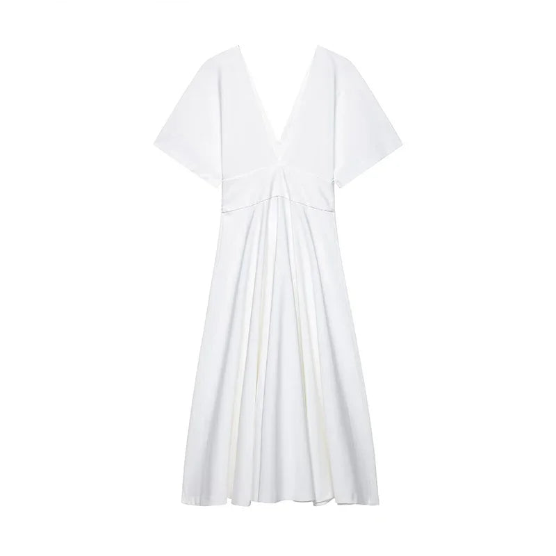 White dress with a V-neck and short sleeves on a white background