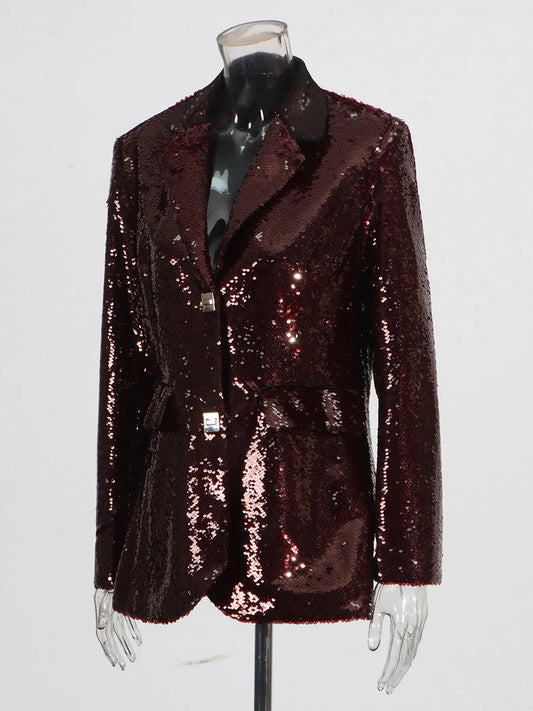 Tailored sequin jacket shown in a refined silhouette
