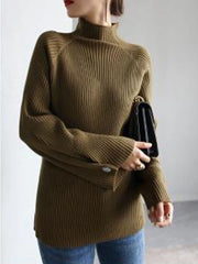 A woman wearing a Green  cozy half-high collar knit sweater, perfect for fall and winter. Golden Atelier 2