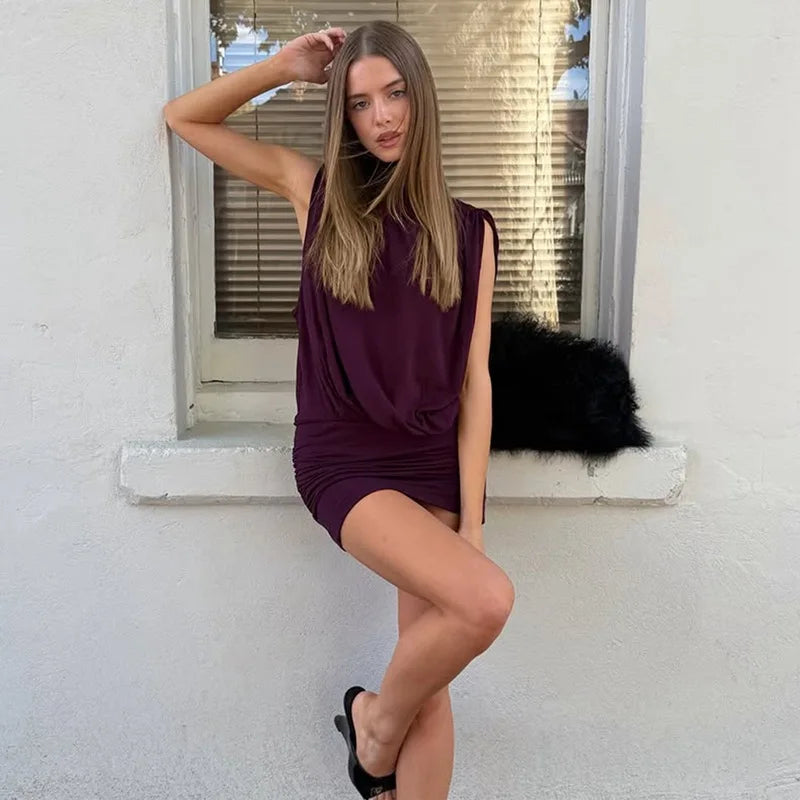 Deep purple mock neck ruched mini dress, sleeveless with open back detail