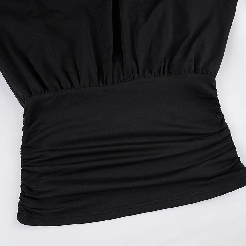Black strapless top on a white background