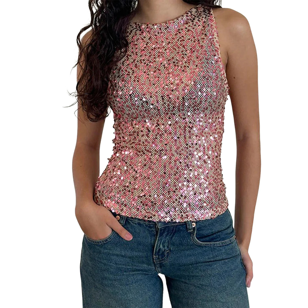 Person wearing a sequined top and jeans on a white background