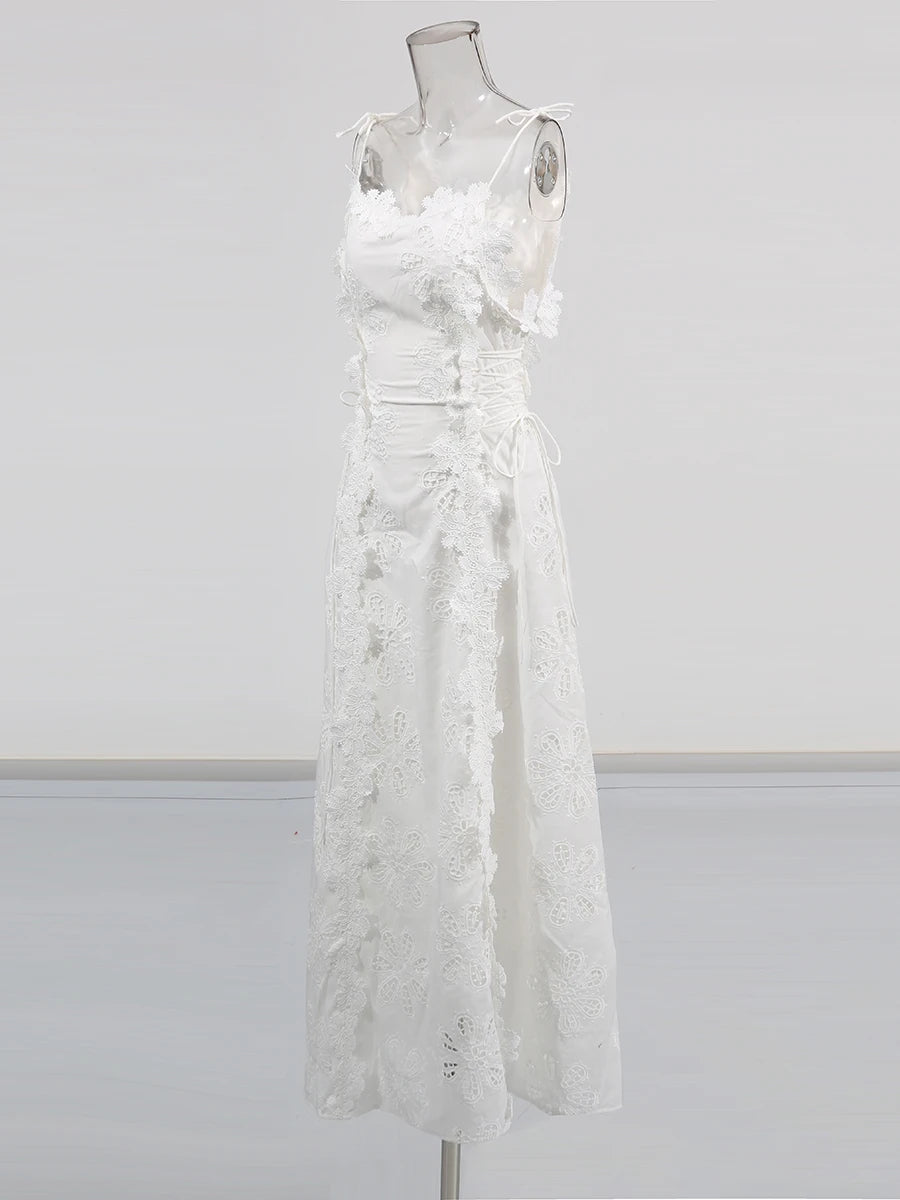 White lace dress on a mannequin against a white background