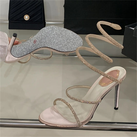 Close-up of the sole of a silver crystal embellished sandal