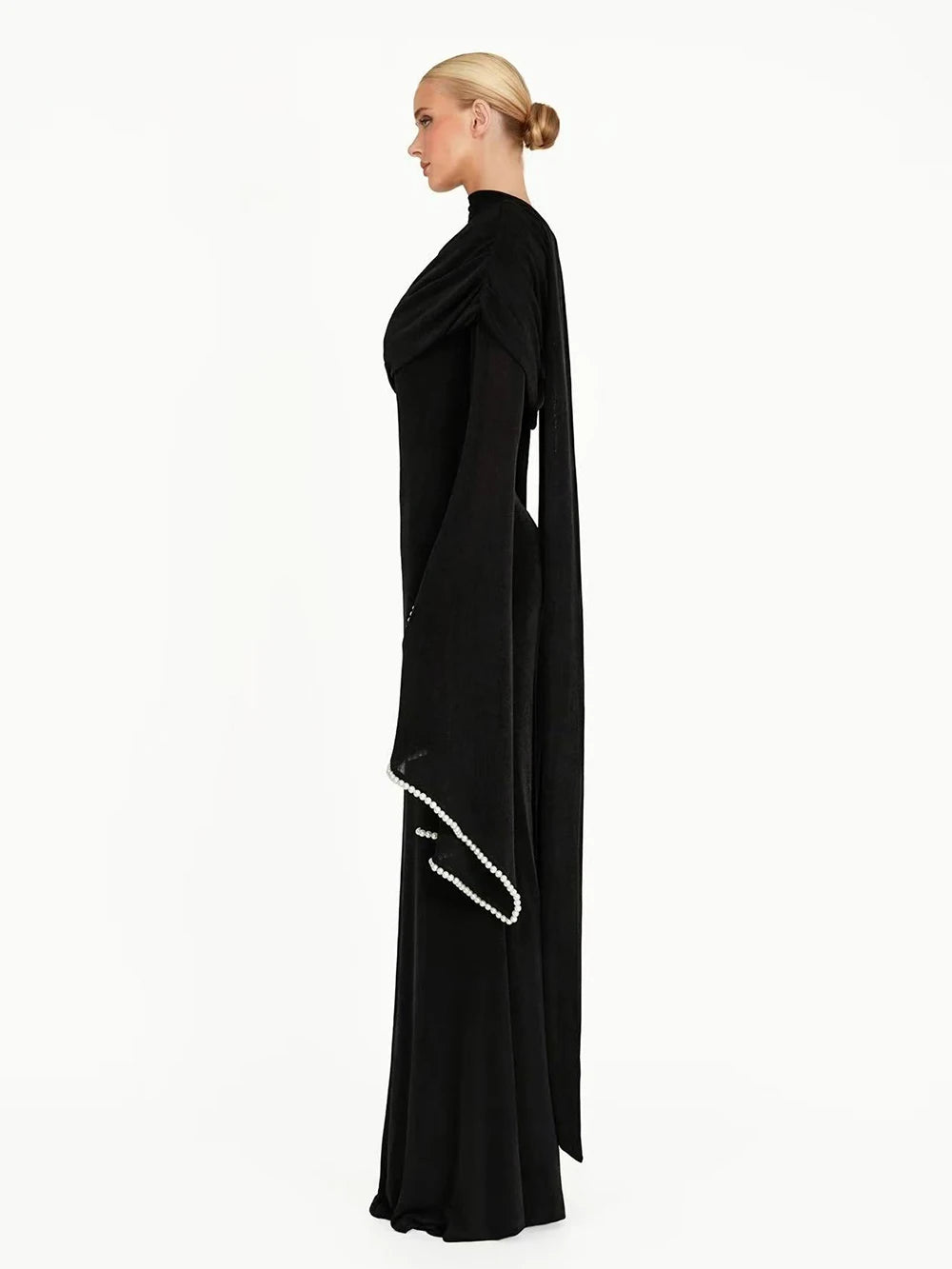 Off shoulder trumpet sleeve beaded neck long black dress side view