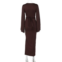 Brown dress on a mannequin against a white background