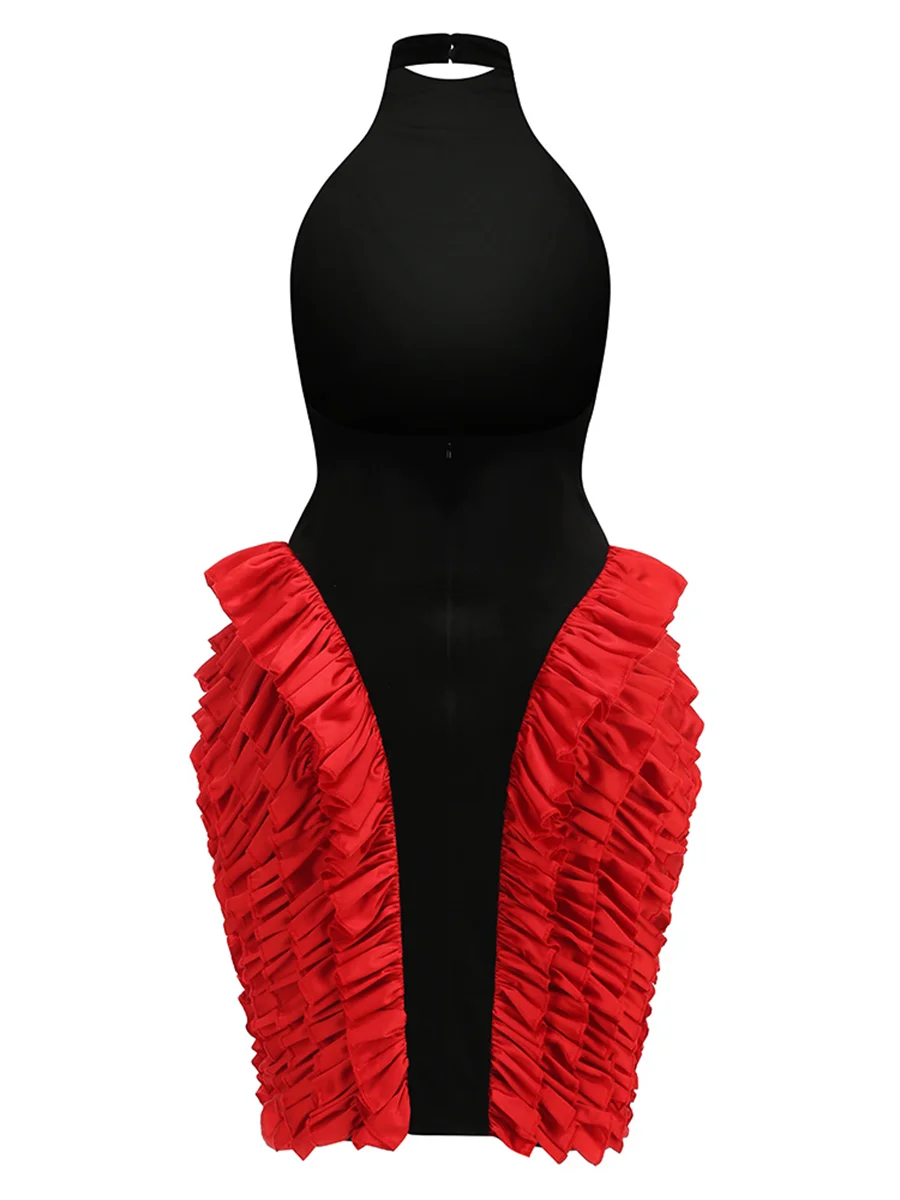 Product mannequin display of black velvet halter dress with red ruffles