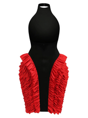 Product mannequin display of black velvet halter dress with red ruffles