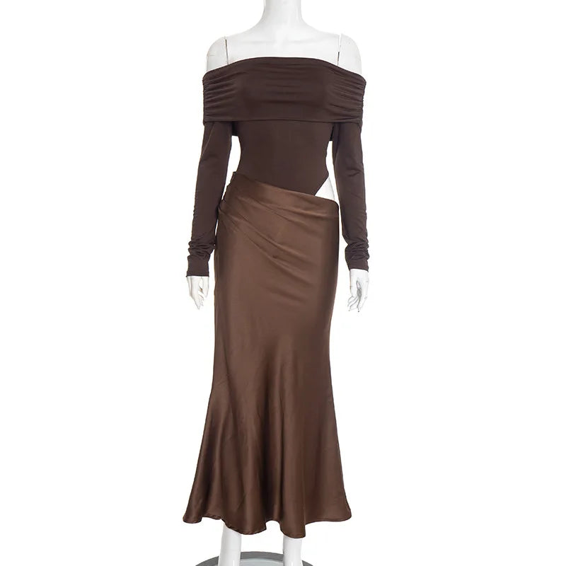 Brown off-shoulder dress on a mannequin against a white background