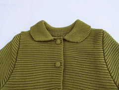 Close-up of the cardigan highlighting its single-breasted button closure and delicate knit texture. Golden Atelier 4