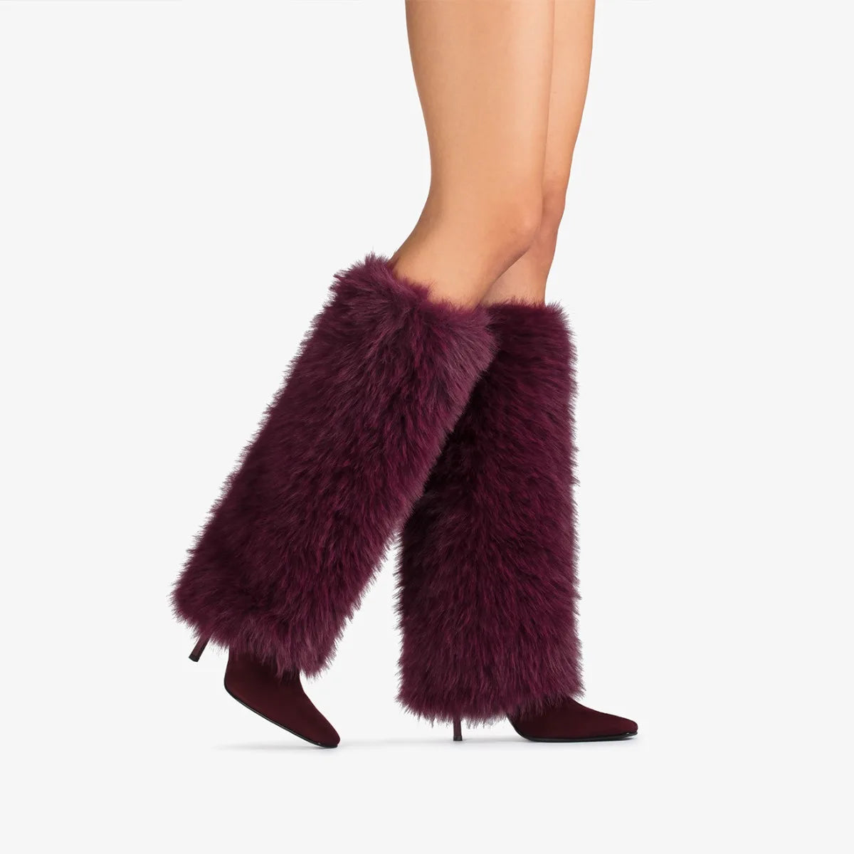 Purple furry boots worn by a person 