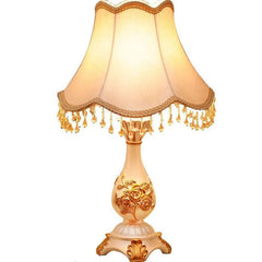 Elegant European-style Table lamp with a sleek design and warm, ambient lighting. Golden Atelier 2