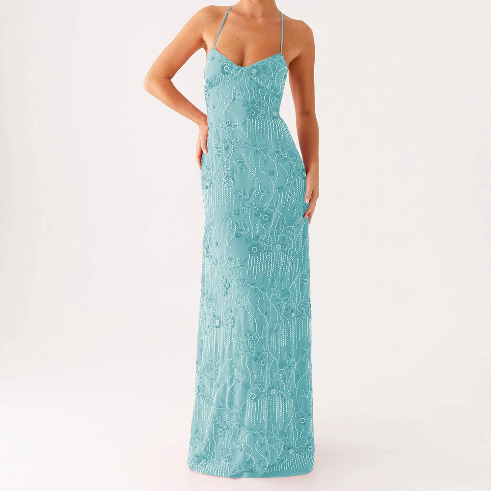 Teal lace dress on a white background