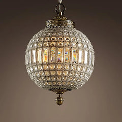  Close-up of the chandelier, showcasing the sparkling crystal balls and intricate design.  Golden Atelier 3