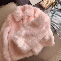 Women’s pink shaggy faux fur coat with turn-down lapel and full sleeves.