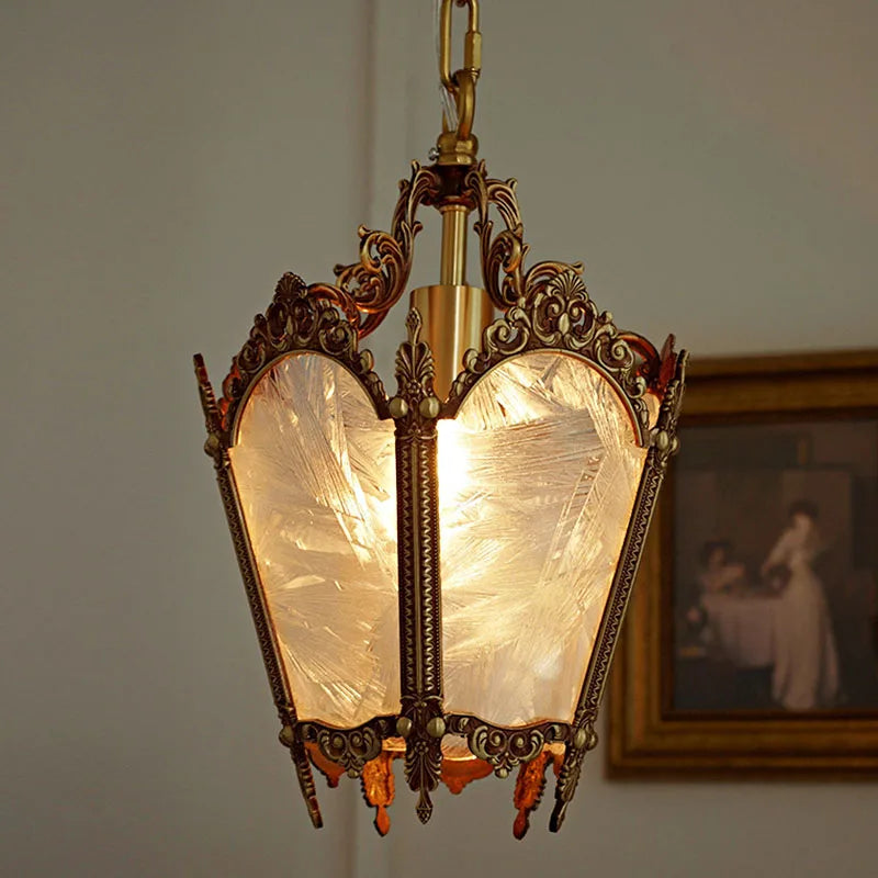 A charming French-style chandelier with a retro copper finish and ice flower glass shades.