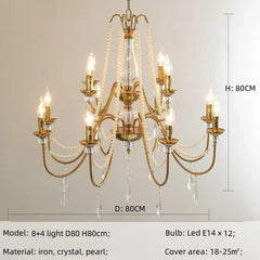 Gold chandelier with crystal and pearl accents on a neutral background, including dimensions and bulb information.