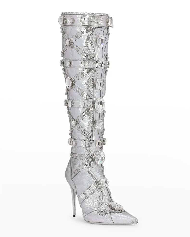 Silver knee-high boot with intricate design
