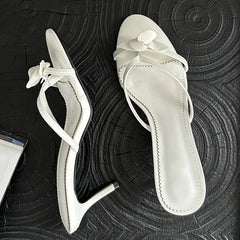 White flower embellished thin heel mules