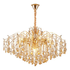Gold chandelier with crystal accents on a white background