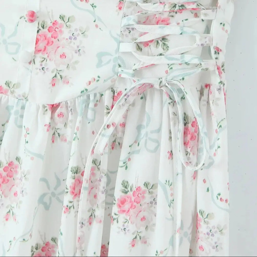 Floral dress with pink flowers on a white background