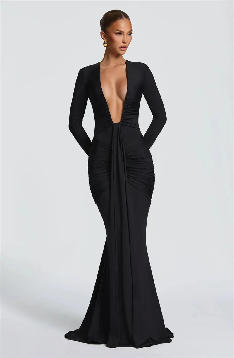 Black evening gown with a plunging neckline on a white background