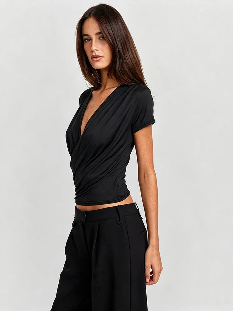 Black draped V-neck short sleeve top side view