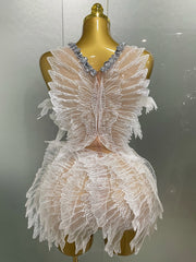 Back view of white crystal wing mini dress