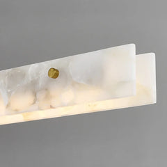 Close-up of the pendant light's intricate marble veining and warm LED glow Golden Atelier 4