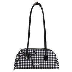 Black and white gingham pattern shoulder bag with black patent handles and a black bow detail.
