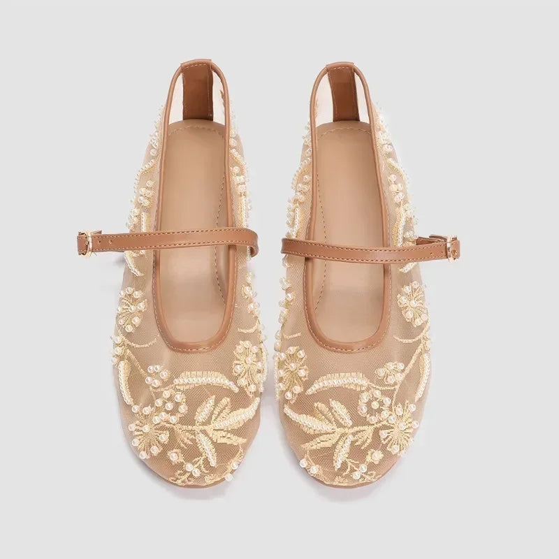 Top view of embroidered mesh ballet flats