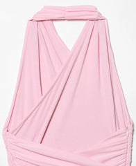 Pink halter top on a light gray background