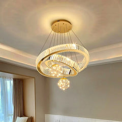 A glamorous crystal chandelier cascading with light, perfect for a luxurious living room. Golden Atelier 4