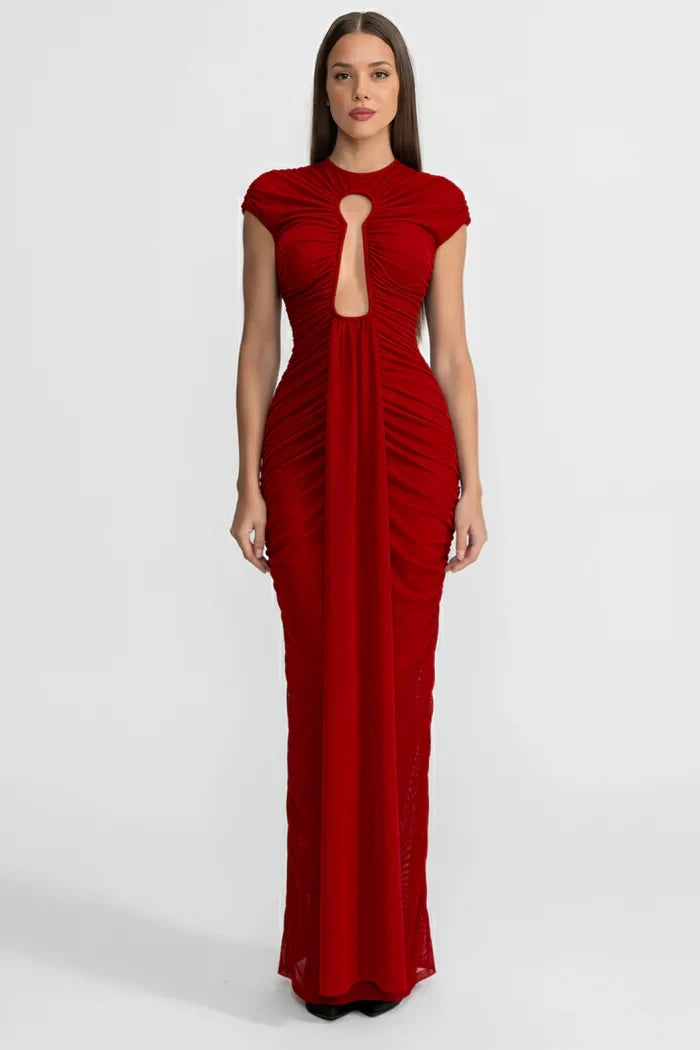 Red evening gown with cut-out design on a white background