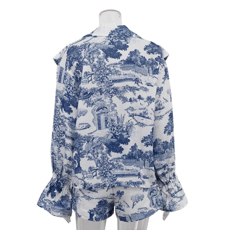 Mannequin wearing a blue and white toile shirt on a white background