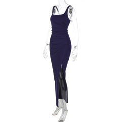 Navy blue evening gown on a mannequin against a white background