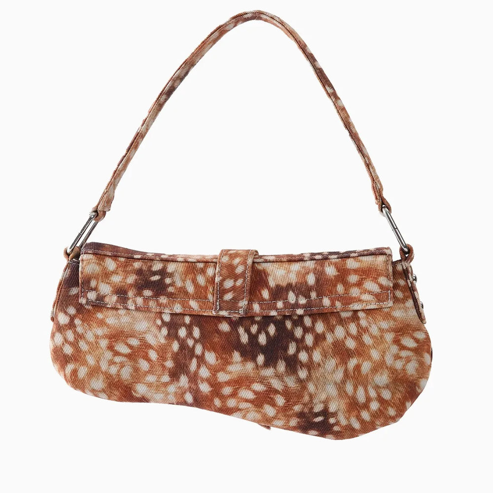 Side view of a deer print saddle bag