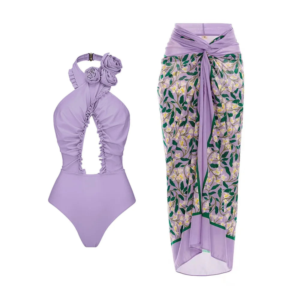 Lavender floral one-piece swimsuit and matching cover-up skirt.