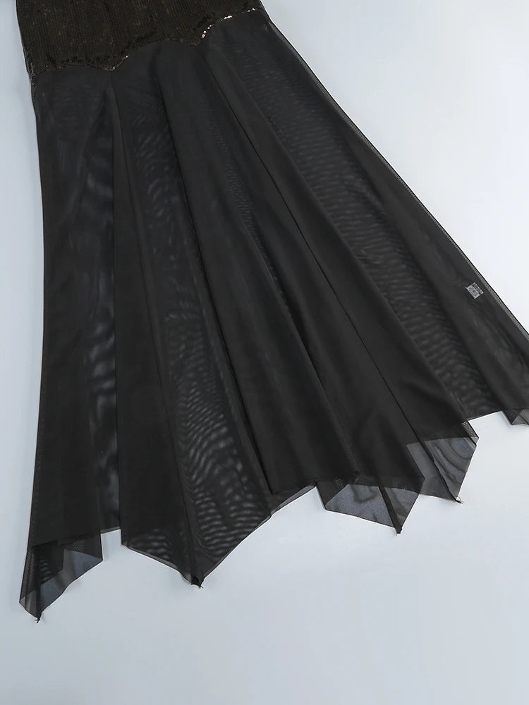 Black sheer skirt on a white background