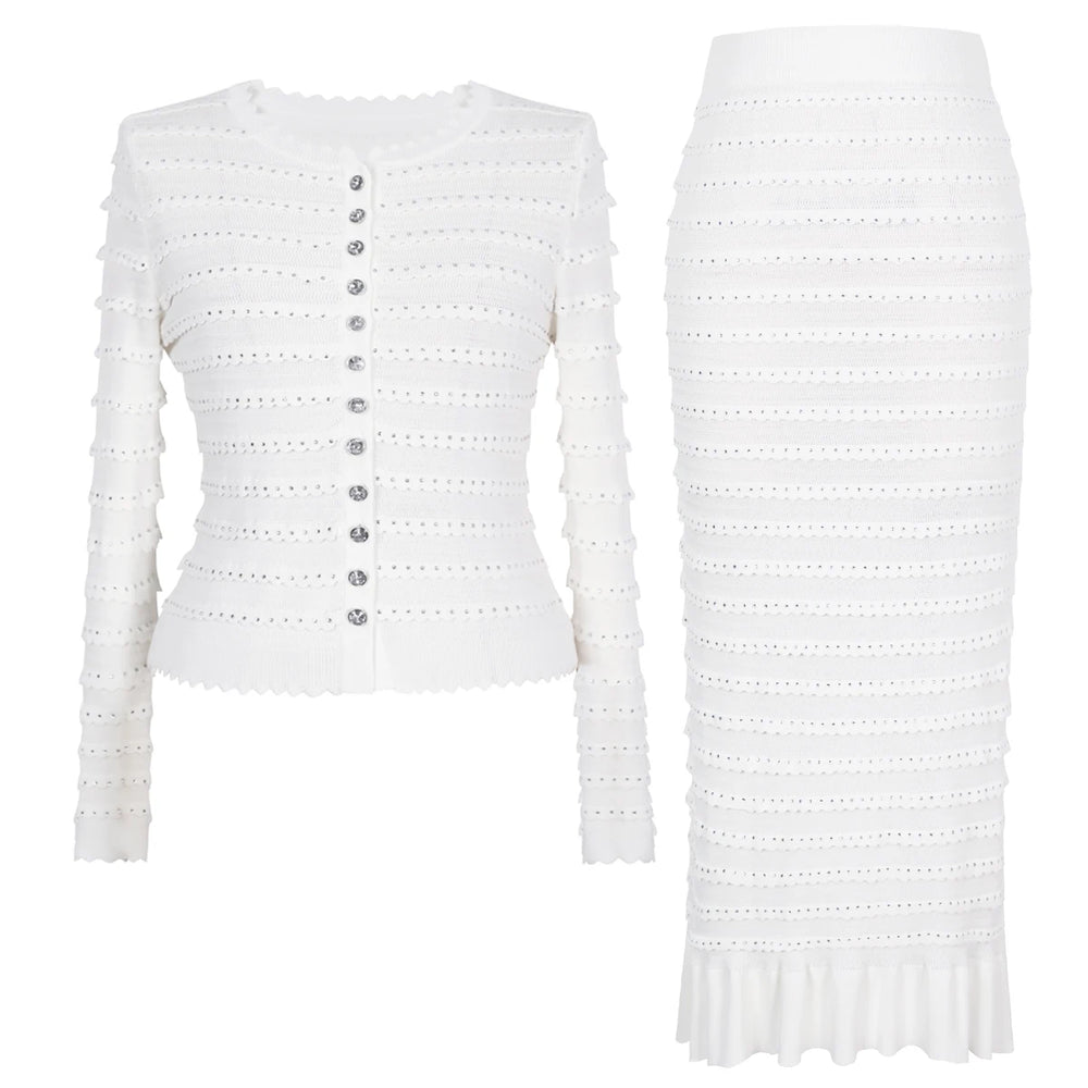 White knit cardigan and midi skirt set laid flat.