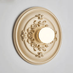 Close-up of a Parisian Art Deco sconce, showcasing its geometric lines and the creamy texture of the milk white glass. A