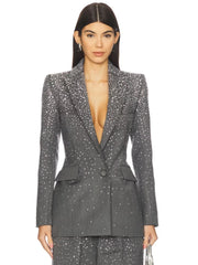 Close-up of the grey crystal-embellished blazer, showing the lapel and front button detail.