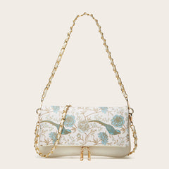 White floral print chain shoulder bag with blue accents