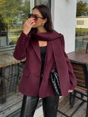 Women’s fashion woolen blazer jacket with scarf and long sleeves.